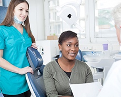 Smiling patient attending dental implant consultation in Vero Beach