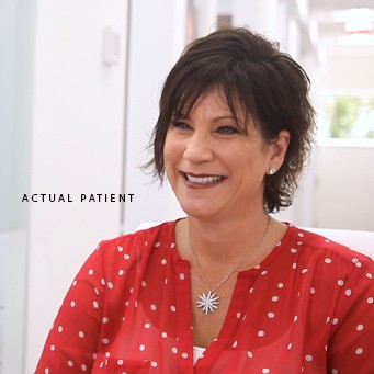 Smiling woman who is a current patient