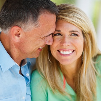 Smiling older man and woman