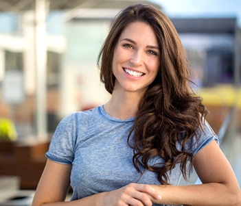 A young woman smiling