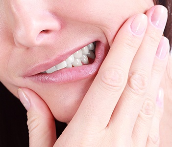 Closeup of grimacing patient
