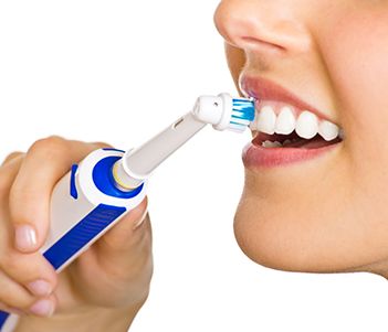 Closeup of person brushing teeth