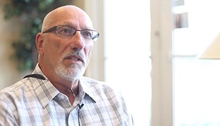 Man with glasses in Vero Beach dental office