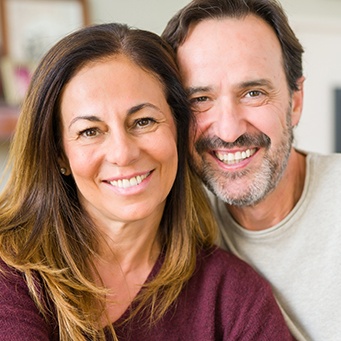 Smiling older man and woman