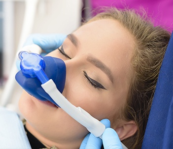 Patient with nitrous oxide mask in place