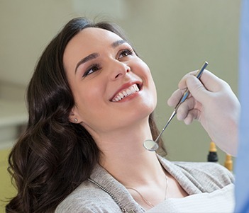 Smiling woman in dental chair