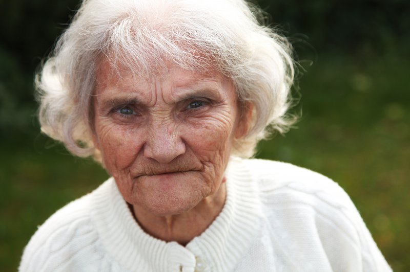 frowning older woman